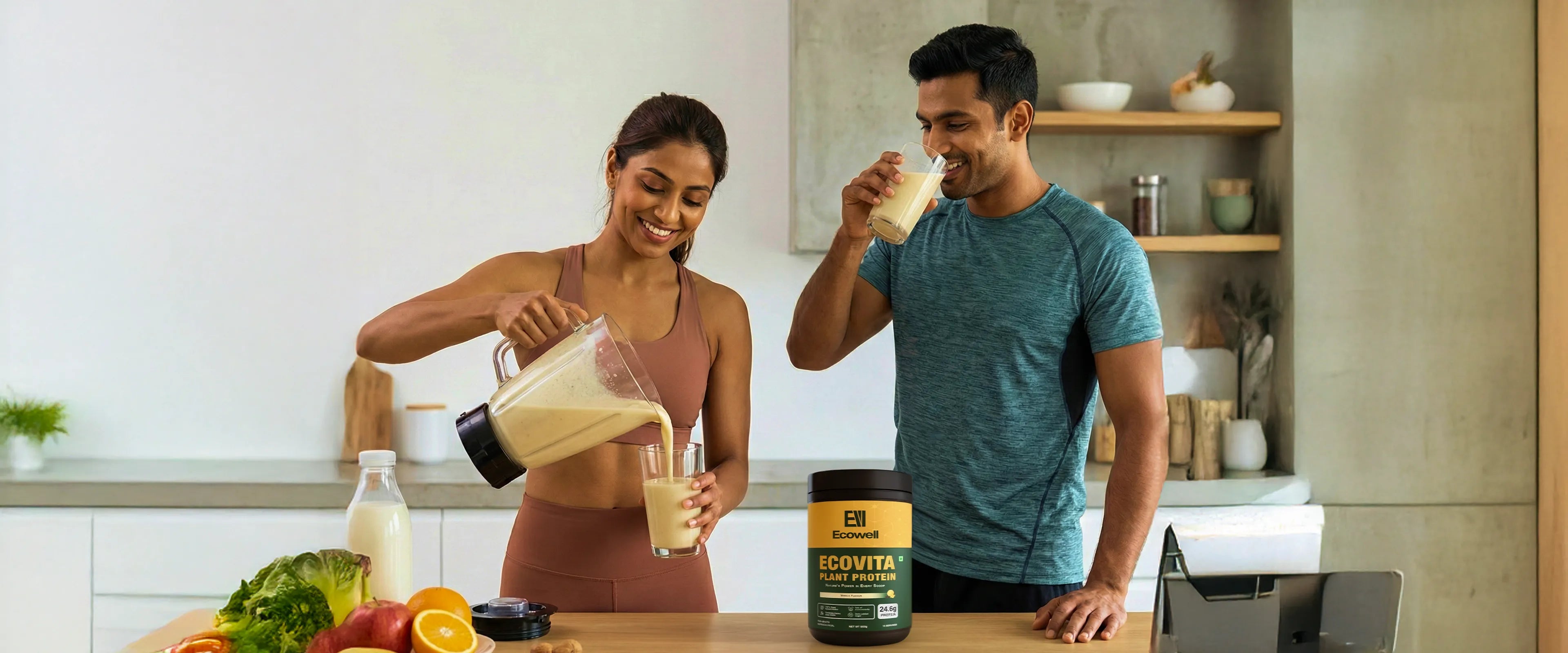 Man and woman in a kitchen with a container of ECOWELL Ecovita plant protein powder.
